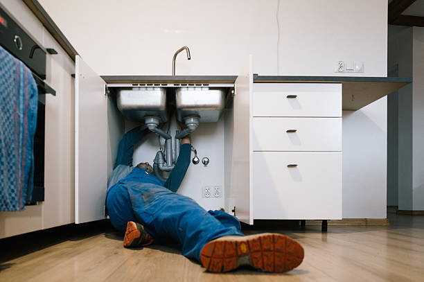 Professional Plumbing technician working in Bellerose, NY